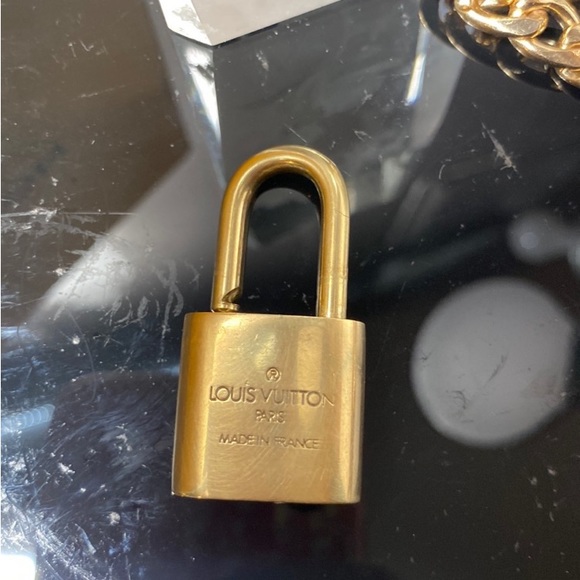 Authentic Louis Vuitton Lock on Charmed chain - Picture 4 of 6